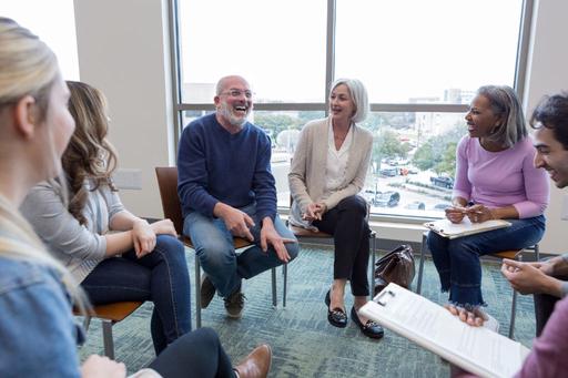 group of people in a coaching session
